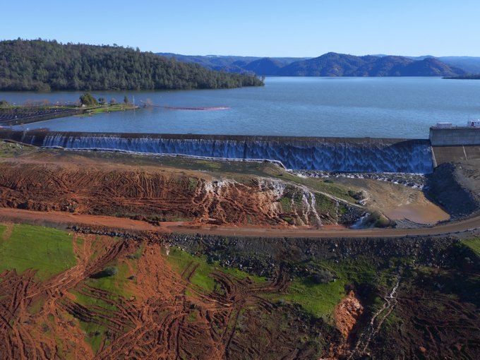 Lake Oroville surges over emergency spillway for first time in history